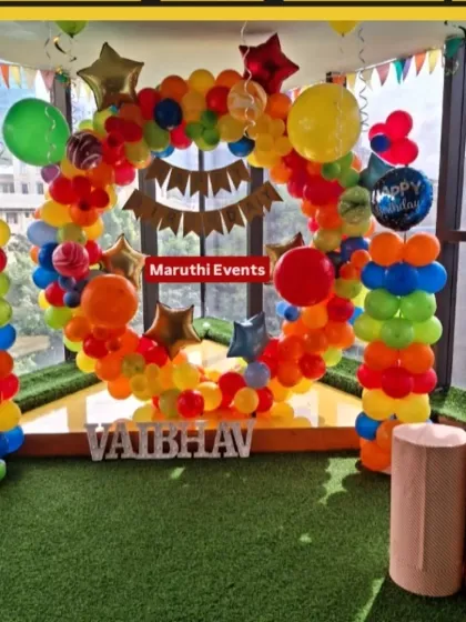 A simple and colorful circular balloon arch. This versatile design can be used for any celebration and is set up here with a green turf floor.