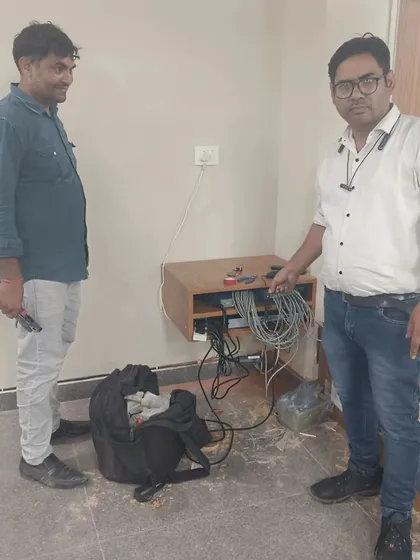 A look at the backend of an IP camera installation. I am organizing the network video recorder (NVR) and wiring to ensure the system is easy to maintain and runs without issues.