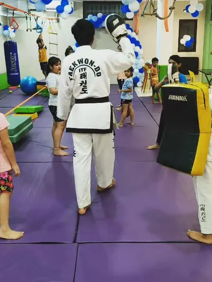 A Taekwondo player doesn't need a weapon, they are one. An instructor demonstrates a technique during a class, showing the power and discipline we instill in our students.