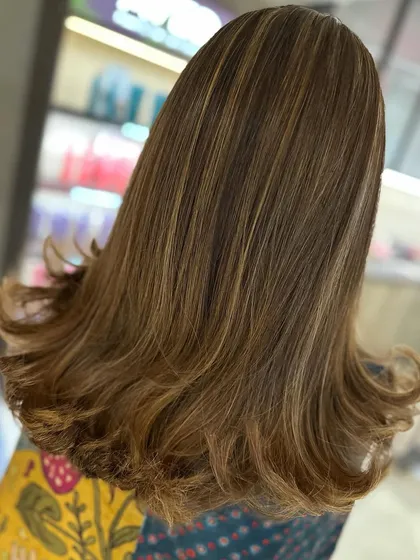 Fresh highlights for this client. The video shows the beautiful movement and volume of her new hair, and she is clearly thrilled with the result.