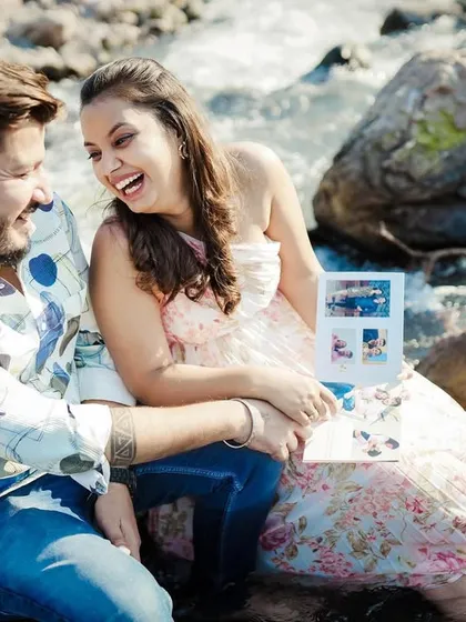 Capturing genuine laughter is my specialty. This candid shot by the water shows the couple enjoying their pre-wedding experience.