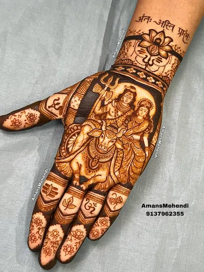 A portrait of divine love with Shiv and Parvati seated on Nandi. I focus on capturing the serene expressions and intricate details, from Parvati's jewelry to the Trishul of Shiva, making it a centerpiece of the bridal henna.