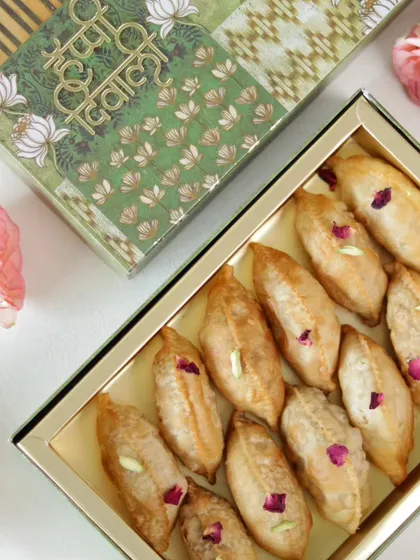A box of 12 Nutty Gujiyas, a traditional sweet treat that is a must-have for Diwali.