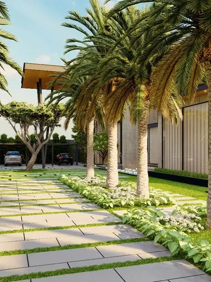 A visualization of a classy farmhouse driveway lined with a palm tree avenue and a sleek water channel. The design combines formal planting with modern water features and grass-jointed paving for a sophisticated entrance statement.