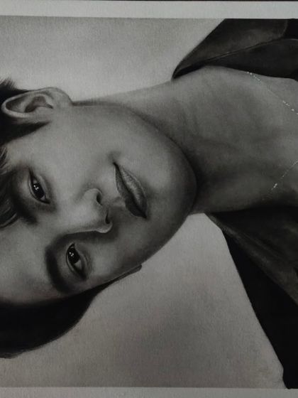 A different angle of the Ohm Pawat sketch, showing the texture of the paper and the smooth blending of the graphite.