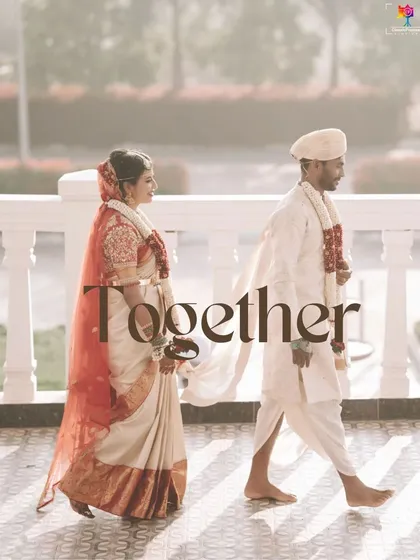 Together, they walk into their new life. This candid shot captures the natural movement and connection of the couple in their traditional Muhurtham attire, telling a story of their journey.