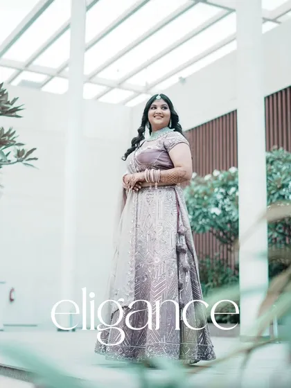 A stylish portrait of the bride, with the word 'elegance' overlaid to highlight her graceful look.