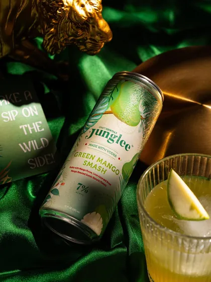 Creating a mood with light and texture. We used dramatic lighting and a rich, green satin cloth to give this shot of Junglee's Green Mango Smash a luxurious and mysterious feel.