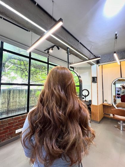 The final result of this absolute brown color transformation, looking vibrant and healthy from every angle.