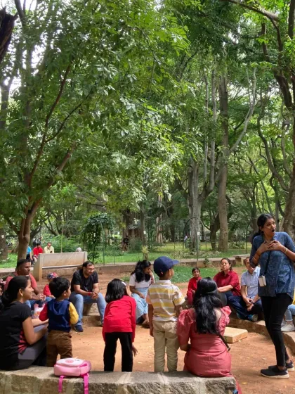Under a canopy of leaves, with birdsong as our music, I gather our tribe for story time. This is where imaginations run wild, as we share tales of forest creatures and magical adventures, building a community of young explorers and parents.