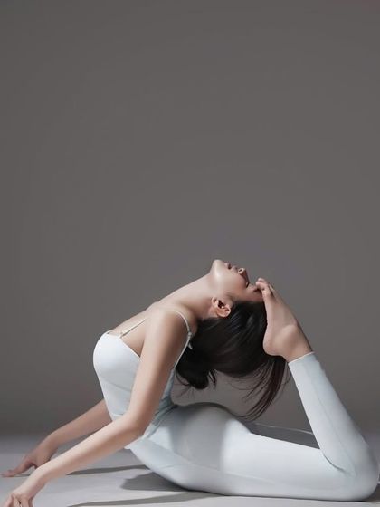 A closer look at the alignment in Purna Bhujangasana. Notice the deep arch of the spine and the open chest, which are hallmarks of this advanced backbend. We teach the progressive steps to approach such asanas safely.