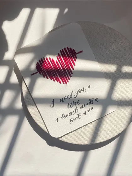 "I need you like a heart needs a beat." A little bit of romance captured in a handmade card, with the sunlight creating beautiful shadows.
