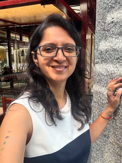 A smiling headshot of me. I've seen professionals from all walks of life change their entire trajectory by publishing a book to build influence, not just income.