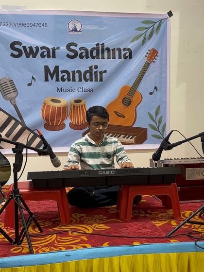 A young keyboardist performs his piece with concentration and skill. Our stage events are a goal for students to work towards, motivating them to practice and perfect their playing.