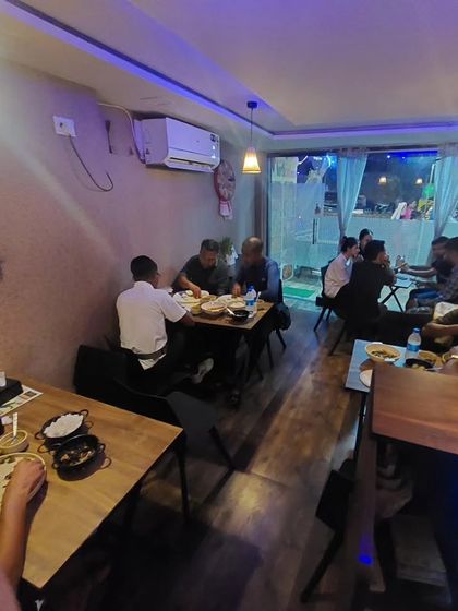 The restaurant filled with guests enjoying their meal. This is the sight that makes all the hard work worth it.