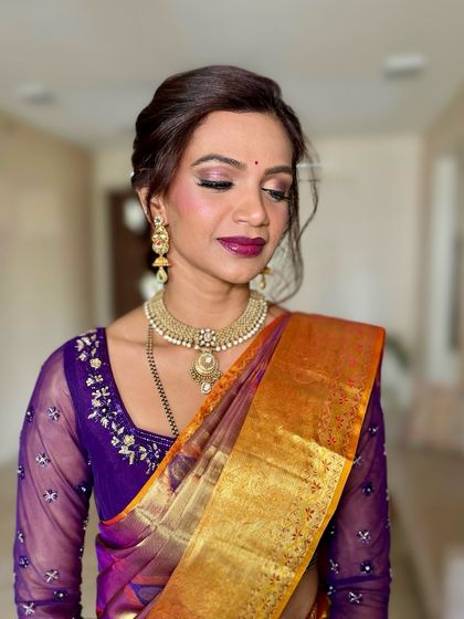 Here you can see the detail of the soft, shimmery eye makeup. It adds a touch of glamour without being overpowering, letting the bride's natural eye shape shine.