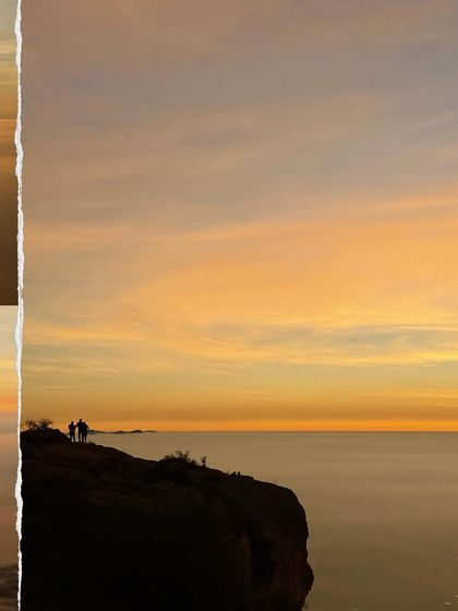 Silhouettes of trekkers against the beautiful orange sky during sunrise at Kaiwara Betta.