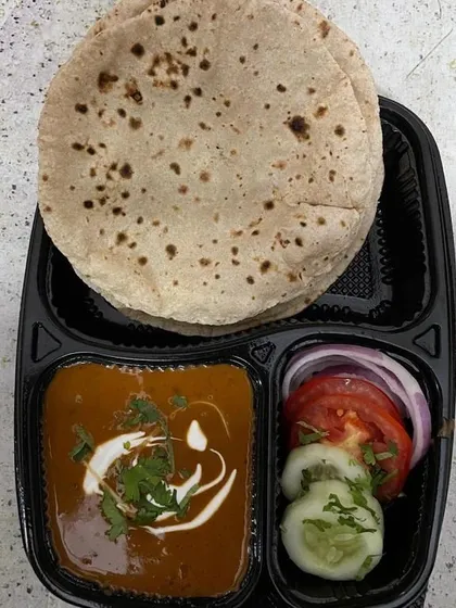 This is my classic home-style tiffin, featuring soft rotis made from fresh chakki atta, served with a comforting dal, and a side of fresh salad. It's the perfect simple and satisfying vegetarian lunch or dinner.