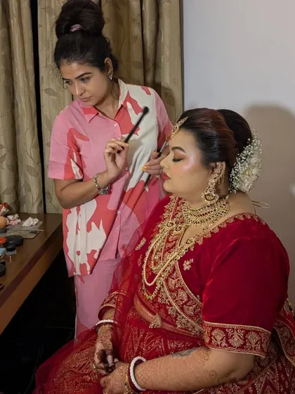 A behind the scenes shot of me working on Shreyoshi's look. I believe in taking my time to perfect every detail, ensuring my clients feel pampered and beautiful.