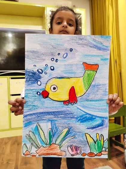 Another beautiful example from our fish drawing and coloring session. It's amazing to see the different color choices each student makes.