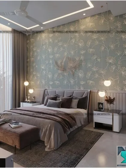 In this bedroom, a beautiful floral wallpaper creates a soft and romantic feature wall. The design is complemented by simple, modern furniture and warm pendant lighting for a cozy and inviting feel.