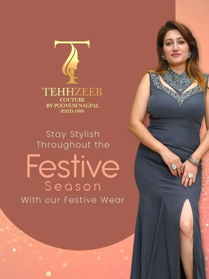 This grey evening gown is designed for elegance and sophistication. The fitted silhouette, thigh-high slit, and embellished high neckline create a look that is both modern and timeless, perfect for any formal event.