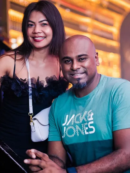 Posing with a guest.