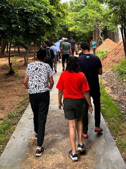 The Salesforce team walks along the restored path at Aravali Creek. These green corridors are a result of the collective effort of our partners and community.