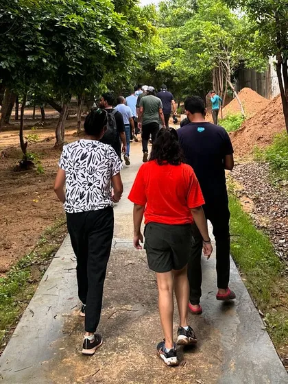 The Salesforce team walks along the restored path at Aravali Creek. These green corridors are a result of the collective effort of our partners and community.