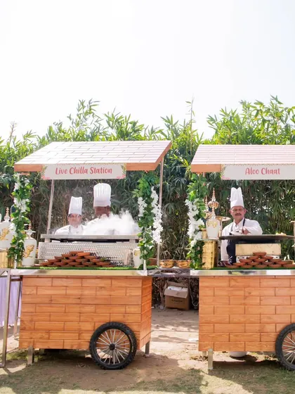 A wide view of two live food stations, one for Chilla and one for Aloo Chaat. This shows how I can set up multiple interactive counters to offer a variety of fresh options.