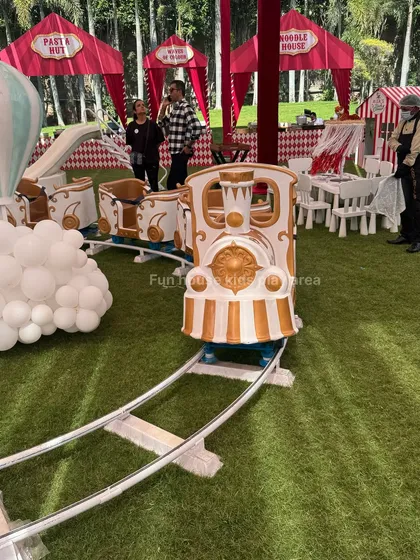 The Fun Express train ready to depart at an outdoor party. Our staff is always on hand to ensure the safe operation of the ride.