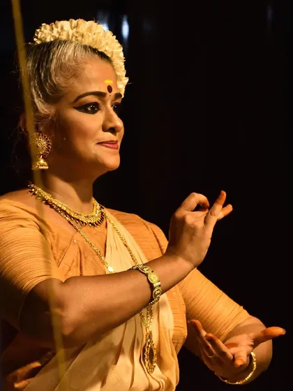 A moment of devotion during a 'sevakkalam' or sacred offering at the Sreeramaswami temple. We craft performances specifically for temple spaces, honoring the spiritual roots of classical dance.