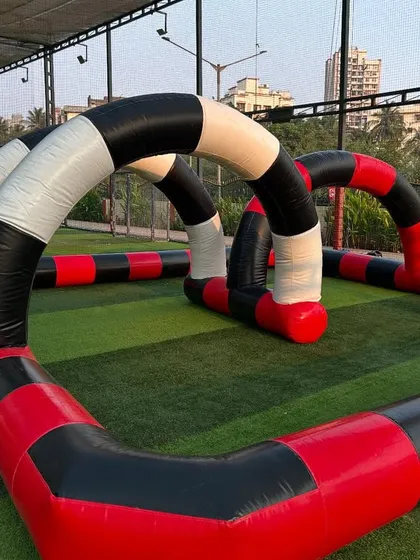 Our inflatable go-kart track is a major attraction for any kids' party. I set up the entire circuit, complete with arches, providing a safe and exciting racing experience for young drivers.