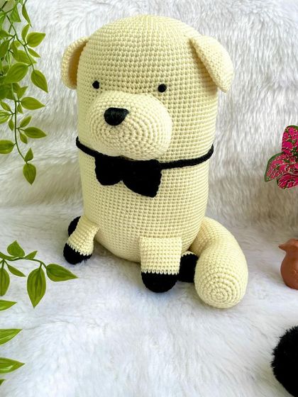 This is Bond, the fluffy dog from the anime Spy x Family. He was made to accompany the Anya doll, creating a perfect pair from the popular series.