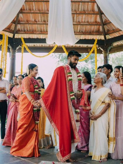 A duplicate of the couple taking their first steps together.