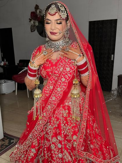 A closer look at the intricate details. The soft smokey eye and perfectly contoured cheeks bring the whole traditional bridal look together.