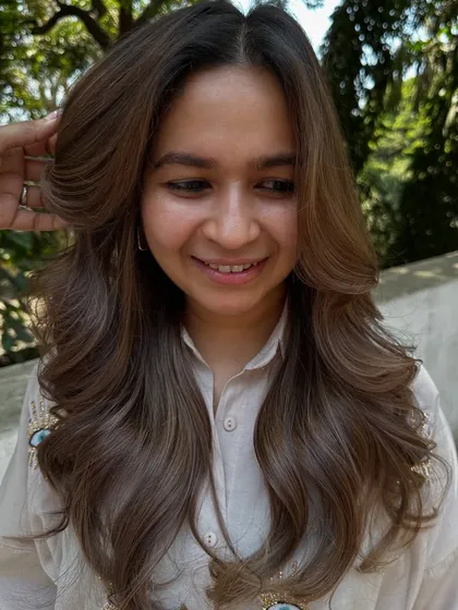 This is what a 'Beige Color Refresh' looks like. We took her faded, brassy hair and transformed it into this soft, beautiful beige blonde with a healthy shine.