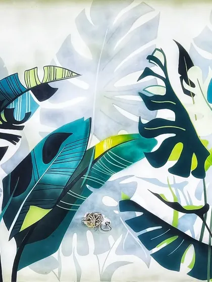 To bring a sense of calm and nature into this office space, I designed and painted a mural of layered tropical leaves. The use of cool blues, greens, and soft greys creates a fresh and modern aesthetic that enhances the work environment.