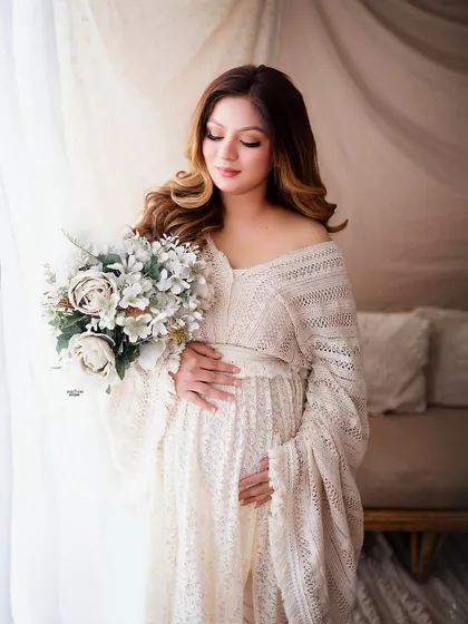 We'll master the art of soft, natural light to create dreamy and timeless portraits. This shot from one of my workshops shows how to style a scene with props and flowers for a beautiful, bohemian feel.