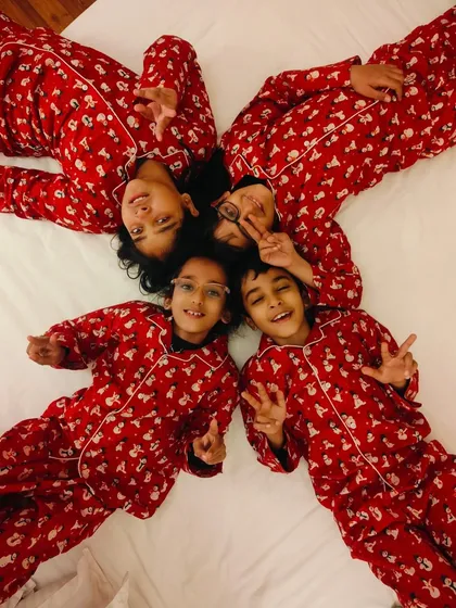 Creating family traditions, one pyjama set at a time. This wonderful group shot in our festive red Christmas PJs captures the joy and togetherness that I hope my clothes bring to your homes.