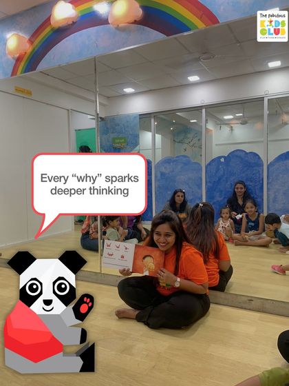 During our story sessions, every "why" from a child is an opportunity. It sparks deeper thinking and encourages a curious mindset. Here, an instructor engages with the children, fostering a dialogue around the story.