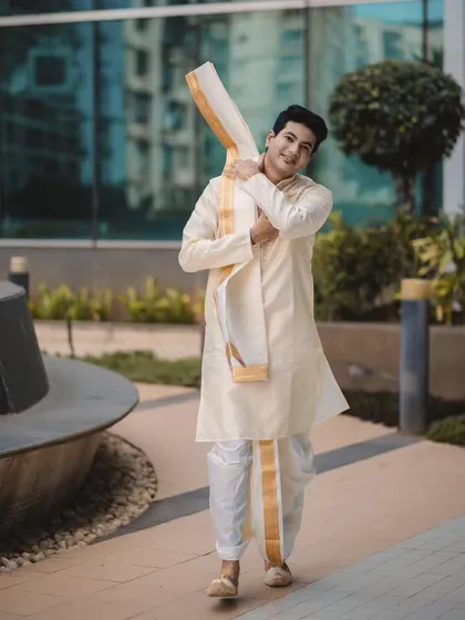 A portrait of the groom, Roshan, looking sharp and happy on his wedding day. We make sure to capture individual portraits that reflect the personality of both the bride and the groom.