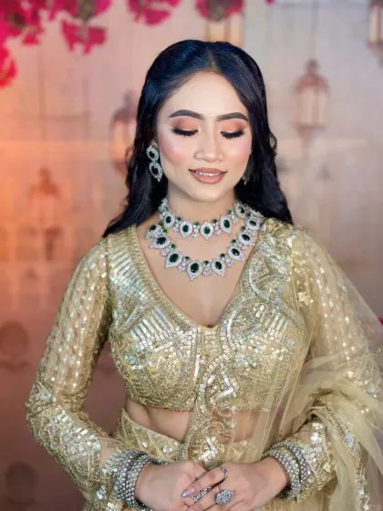 With eyes closed, you can see the beautiful blend of soft peach and brown eyeshadows. This is a versatile eye look that can be adapted for any party.