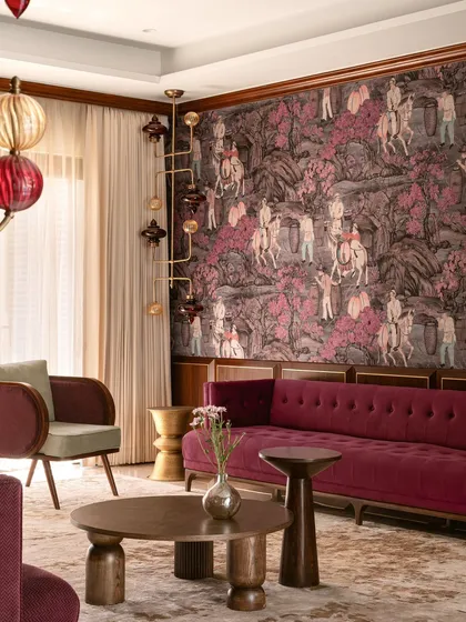 A closer look at the details in this maximalist living room, from the hand-blown glass lighting to the custom-designed furniture. The space is a testament to our love for layering colors, patterns, and unique forms to tell a compelling visual story.