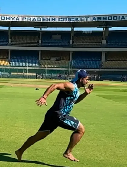 Chasing speed and building strength. A shot of me during a barefoot sprint, focusing on natural running mechanics and foot strength at the Madhya Pradesh Cricket Association stadium.
