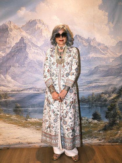 A full length view of the magnificent outfit I styled for Zeenat Aman. The intricate floral patterns and the sheer volume of the jacket make a powerful statement.