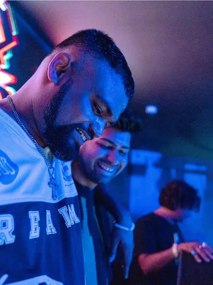 A candid moment of fun and friendship behind the decks. It's the people you share this journey with that make it worthwhile.
