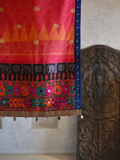 A close-up of the runner, showing the details of the Balinese weft Ikat pattern and the colorful, mirror-studded Banjara panel. This piece is a story of my travels and textile discoveries.