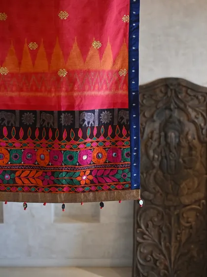 A close-up of the runner, showing the details of the Balinese weft Ikat pattern and the colorful, mirror-studded Banjara panel. This piece is a story of my travels and textile discoveries.