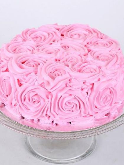 Simple, elegant, and beautiful. This cake is completely covered in delicate pink buttercream rosettes, offering a classic floral look that is perfect for birthdays, anniversaries, or Mother's Day.